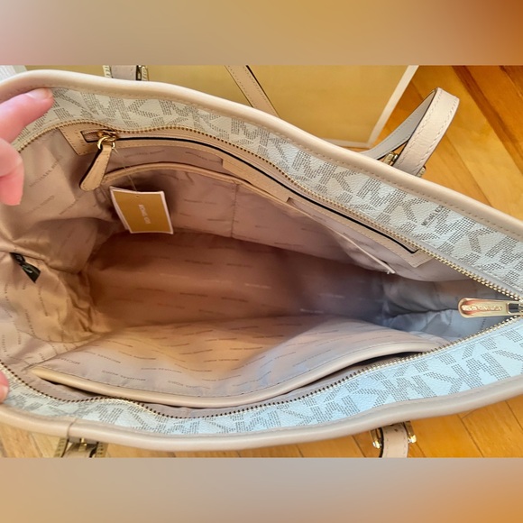**SOLD** Michael Kors Vanilla Monogram Jet Set Travel Tote - Picture 9 of 14